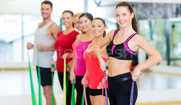Csoportkép edz gumi fitnessz sport képzés Stock fotó © dolgachov