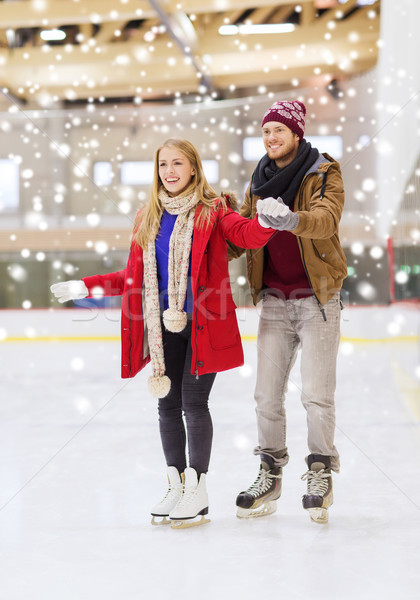 Boldog pár korcsolyázás pálya emberek barátság Stock fotó © dolgachov