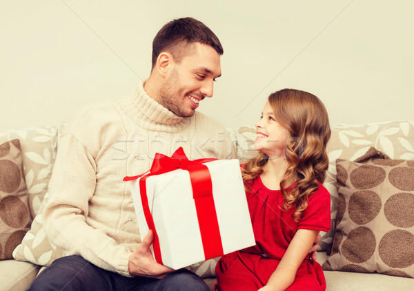 smiling father and daughter looking at each other Stock photo © dolgachov