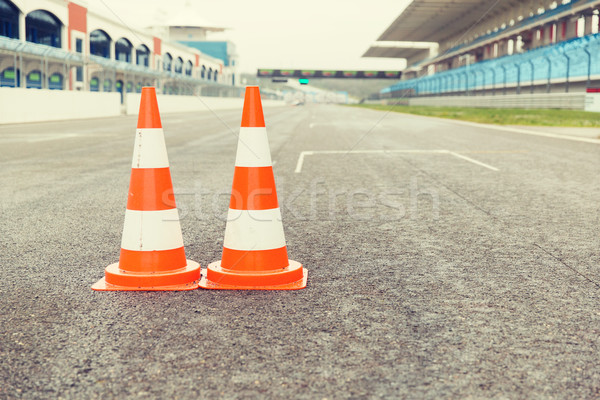 traffic cones on speedway of stadium Stock photo © dolgachov