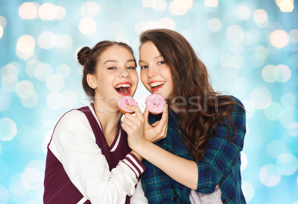 Glücklich ziemlich Essen Donuts Menschen Stock foto © dolgachov