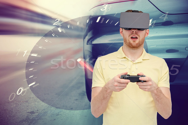 Adam sanal gerçeklik kulaklık araba yarış Stok fotoğraf © dolgachov