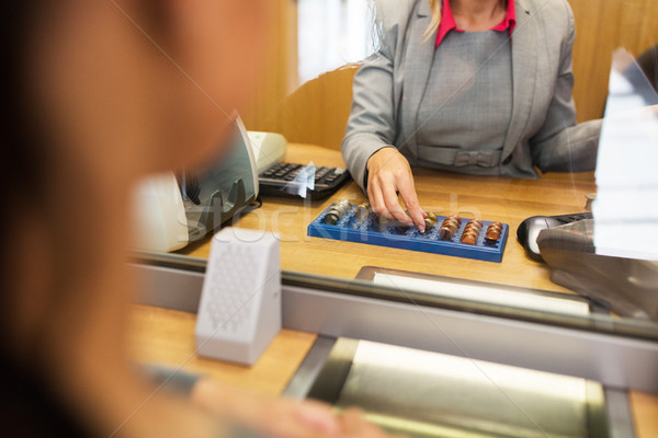 clerk counting cash money at bank office Stock photo © dolgachov