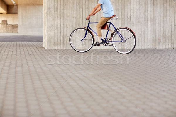 Stock photo: hipster man riding fixed gear bike