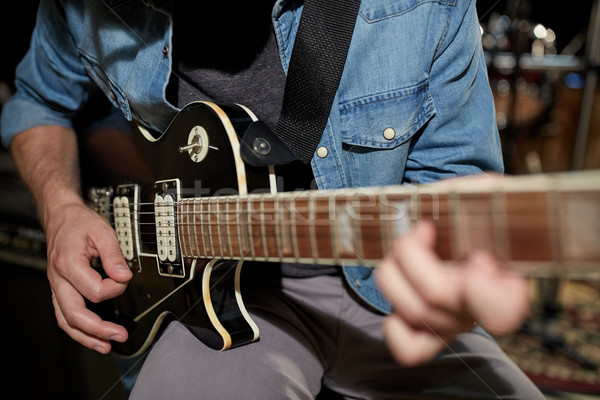 Homme jouer guitare studio répétition musique [[stock_photo]] © dolgachov