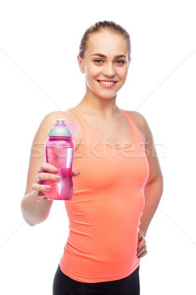 happy sportive young woman with water bottle Stock photo © dolgachov