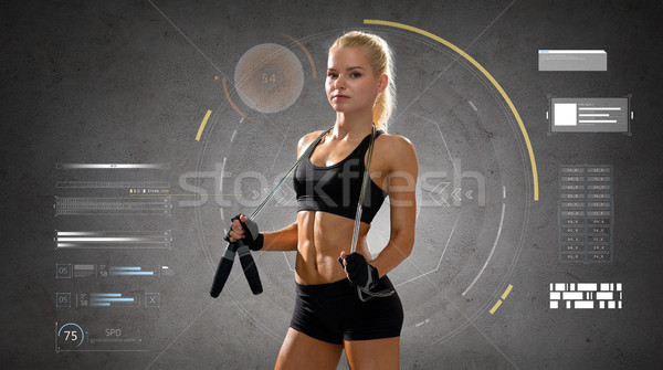 young sporty woman with jumping rope Stock photo © dolgachov