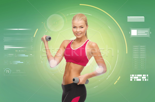 Boldog sportos nő súlyzók bicepsz sport Stock fotó © dolgachov