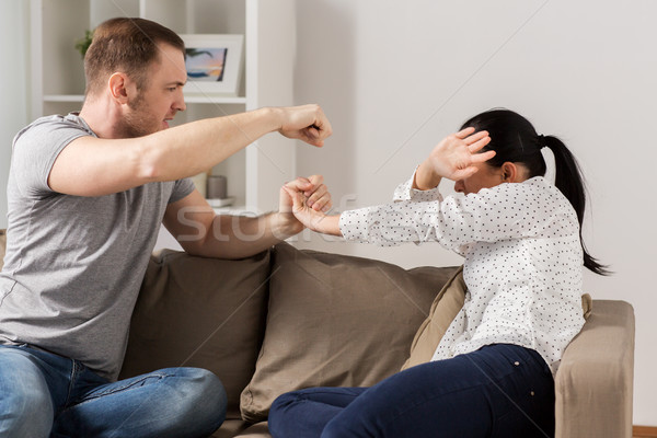 unhappy woman suffering from home violence Stock photo © dolgachov