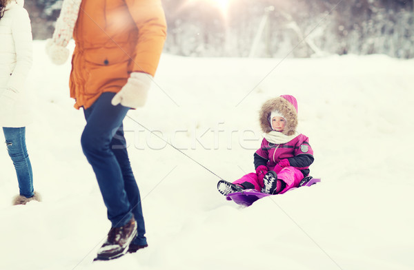 Stock photo: happy family with sled walking in winter forest