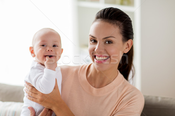 happy mother with little baby boy at home Stock photo © dolgachov