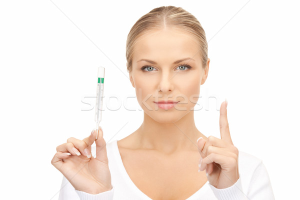 Mulher atraente médico termômetro quadro mulher menina Foto stock © dolgachov