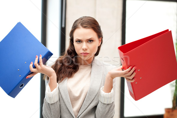 woman with folders Stock photo © dolgachov