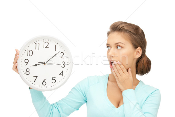 Stock photo: woman holding big clock