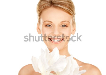 beautiful woman with madonna lily Stock photo © dolgachov