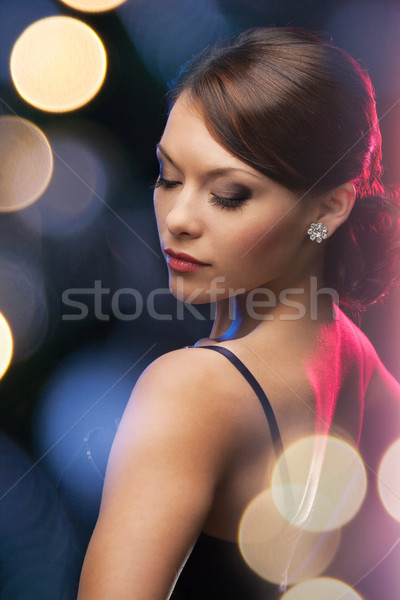 Frau Abendkleid tragen Diamant Ohrringe Luxus Stock foto © dolgachov