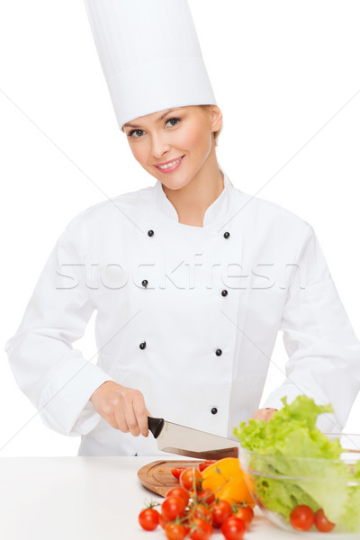 Stockfoto: Glimlachend · vrouwelijke · chef · koken · voedsel