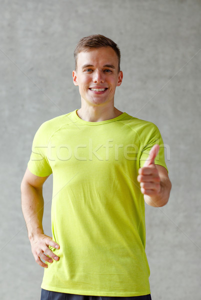 Mosolyog férfi tornaterem sport fitnessz életstílus Stock fotó © dolgachov