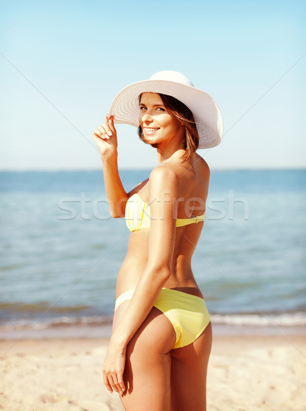 Kız bikini ayakta plaj yaz tatil Stok fotoğraf © dolgachov