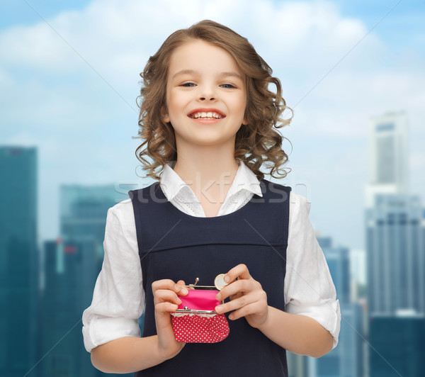 happy girl with purse and euro coin money Stock photo © dolgachov