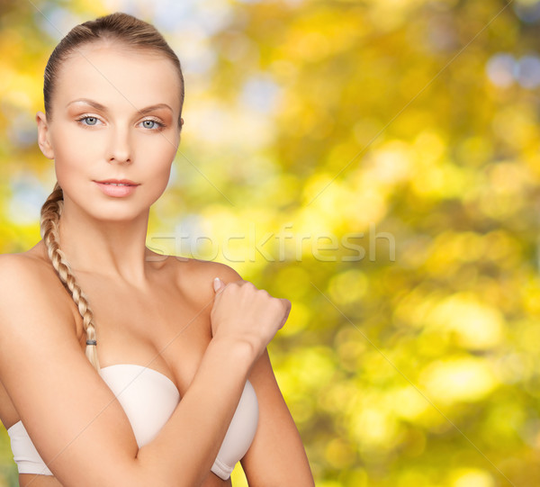 Stock photo: beautiful young woman with bare shoulders