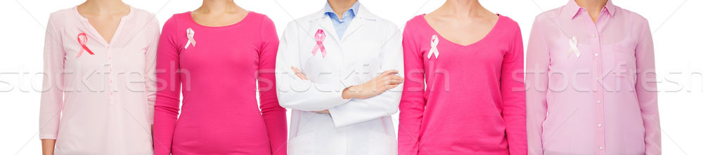 Stock photo: close up of women with cancer awareness ribbons