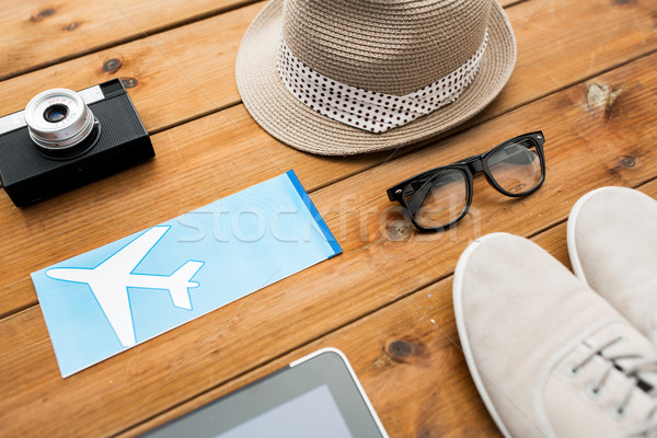 close up of gadgets and traveler personal stuff Stock photo © dolgachov