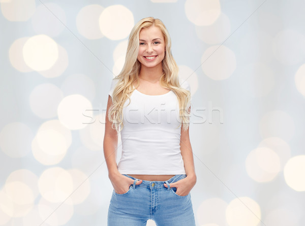 Heureux jeune femme adolescente blanche tshirt passions [[stock_photo]] © dolgachov
