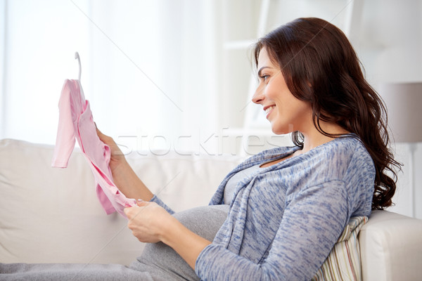 Boldog nő tart lánycsecsemők otthon anyaság Stock fotó © dolgachov