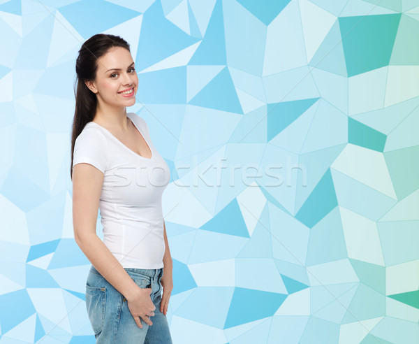 Stock photo: happy young woman or teenage girl in white t-shirt