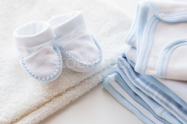 close up of baby boys clothes for newborn on table Stock photo © dolgachov