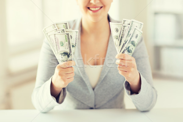 close up of woman hands holding us dollar money Stock photo © dolgachov