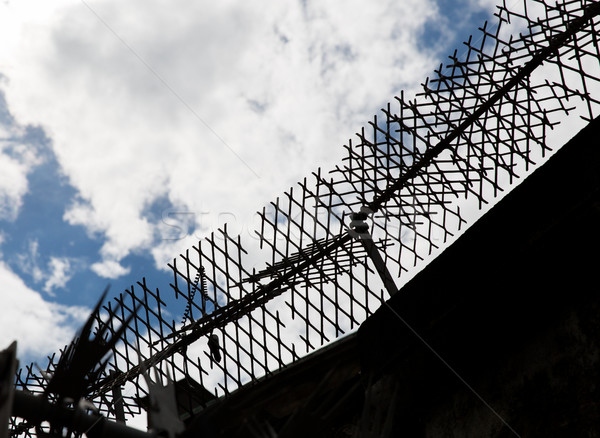 Recinzione filo spinato carcere muro Foto d'archivio © dolgachov