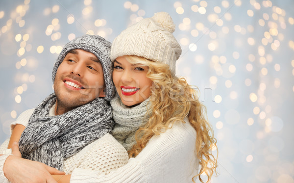 happy family couple in winter clothes hugging Stock photo © dolgachov