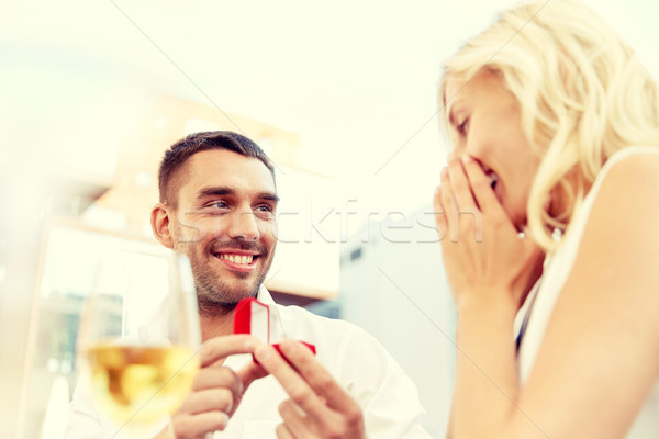 man with engagement ring making proposal to woman Stock photo © dolgachov