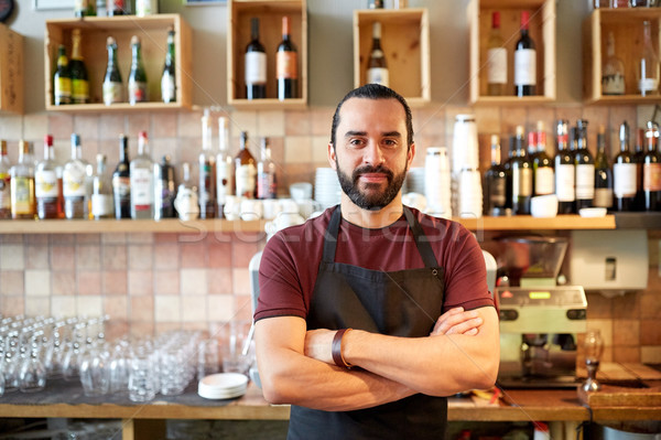 happy man, barman or waiter at bar Stock photo © dolgachov