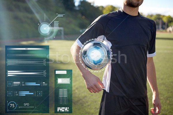 close up of soccer player with football on field Stock photo © dolgachov