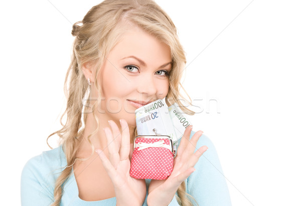 lovely woman with purse and money Stock photo © dolgachov