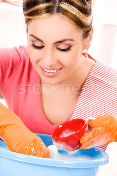 housewife washing dish Stock photo © dolgachov