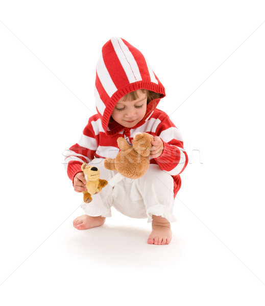 Küçük kız resim peluş oyuncaklar beyaz çocuk Stok fotoğraf © dolgachov