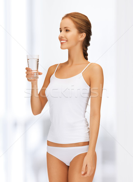 woman with glass of water Stock photo © dolgachov