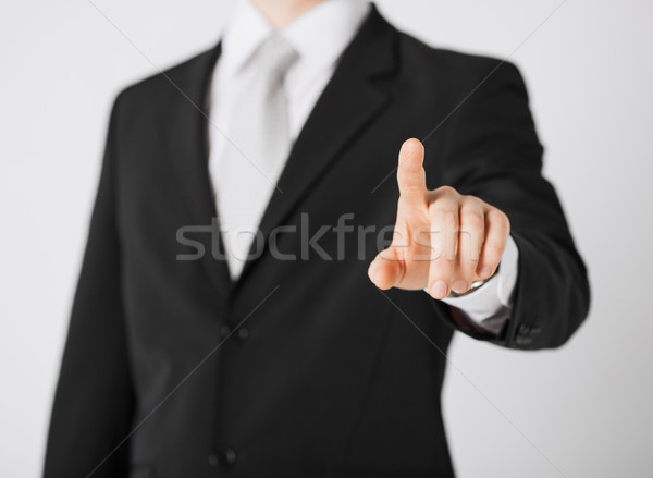 Stock photo: man hand pointing at something