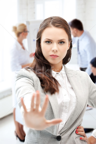 angry businesswoman showing stop gesture Stock photo © dolgachov