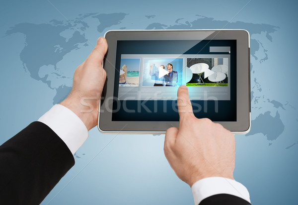 close up of man hands touching tablet pc Stock photo © dolgachov