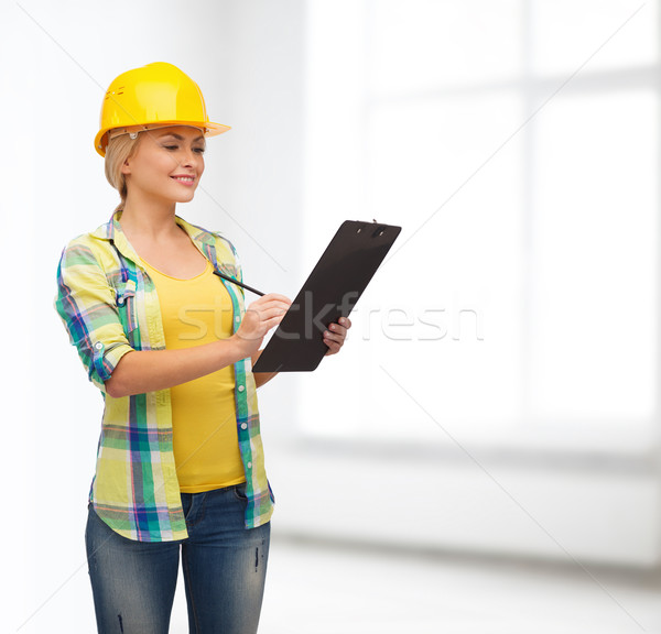 Stockfoto: Glimlachende · vrouw · helm · reparatie · bouw · onderhoud