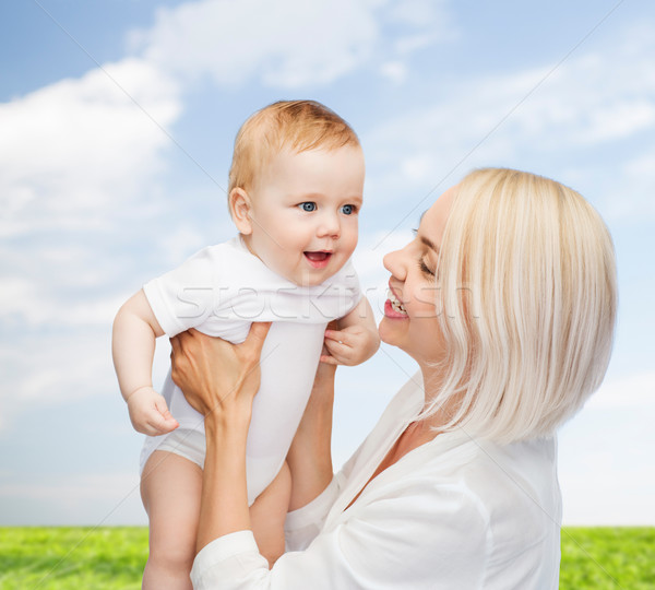 Heureux mère souriant bébé famille enfant [[stock_photo]] © dolgachov