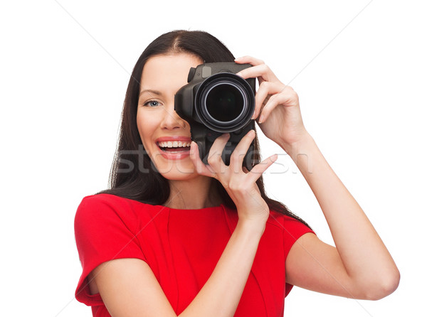 Femme souriante photos appareil photo numérique modernes technologie [[stock_photo]] © dolgachov