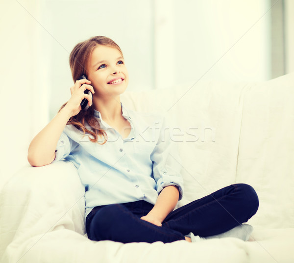 Stockfoto: Glimlachend · meisje · smartphone · home · recreatie · technologie