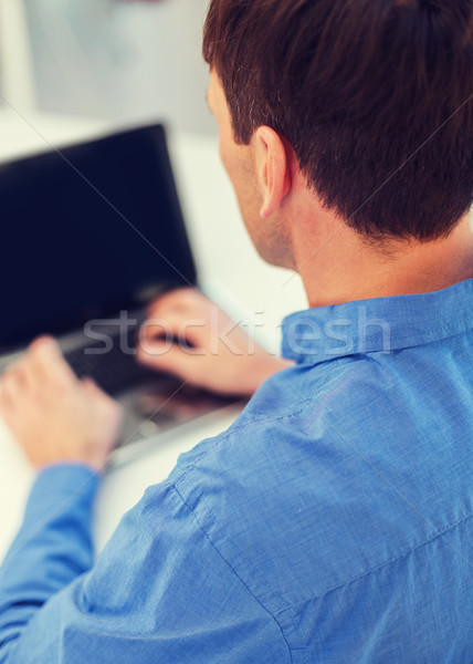 close up of man with laptop computer Stock photo © dolgachov