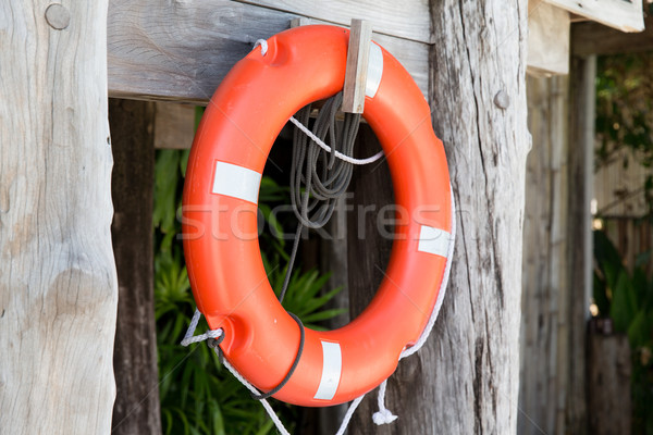 lifebuoy or life preserver hanging on rescue booth Stock photo © dolgachov